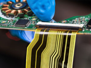 When does rigid-flex PCB cost justify the price premium vs using connectors